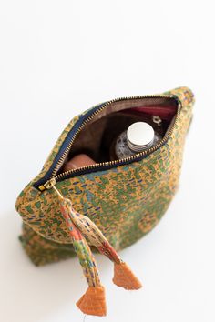 These bags are sewn from vintage blankets made by the Nomadic women and men in India. They would add new layers on the thin blankets as years go by. We have repurposed these lovely blankets into a useful bag. The bag comes with a side loop to hang, unique tassel, zipper on outside and inside zipper pocket. Each is unique and no two alike. Fully lined. Average size: 8" X 8" but vary slightly. Vintage Blanket, Green Item, Pocket Bag, Cute Bags, Zip Pouch, Photo Instagram, Pouch Bag, Zipper Bags, Cotton Bag