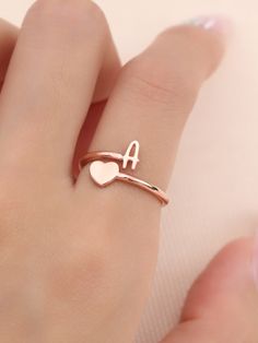 This ring is certain to be enjoyed. Created for special occasion, showcases a letter of your choice, show your love for the important people in your life with this custom Initial Heart ring. Material : 925 sterling silver Finish : 18k Gold - Rose Gold - Sterling silver Important People In Your Life, Small Earrings Gold, Handwriting Jewelry, Gold Heart Ring, Lace Booties, Fancy Jewellery Designs, Letter Ring, Gold Rings Fashion, Stylish Jeans