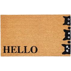 a door mat with black cats on it and the word hello written in large letters