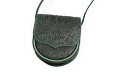 This small green shoulder bag is handmade of cow's leather and processed with manual blanking and piercing method. Your Messenger bag is inspired by unique ethnic style of Carpathian culture, provides great comfort and style and will become a great gift.Dimensions: 16 cm / 6"16 cm / 6"6 cm / 2.2" Strap length 140 cm / 55"Weight 350gr/12ozSoft leather inside lining*Slight deviations from the pictures (leather hue, color of inner lining) may occur. Please make sure You inform us in advance if You Handmade Green Leather Shoulder Bag, Artisan Green Shoulder Bag As Gift, Artisan Green Shoulder Bag For Everyday Use, Green Hand-tooled Bag For Daily Use, Green Hand Tooled Bag For Daily Use, Green Everyday Bag, Traditional Green Shoulder Bag For Everyday, Traditional Green Handmade Shoulder Bag, Green Hand-tooled Leather Shoulder Bag