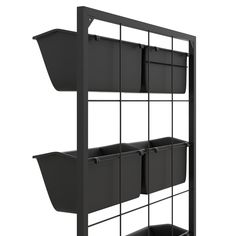 a shelf with three bins and two shelves on it, all in black plastic