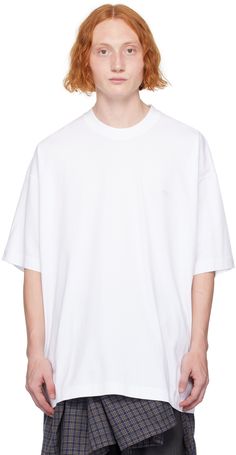 Cotton jersey T-shirt. · Rib knit crewneck · Logo and text printed at chest and back collar · Dropped shoulders Supplier color: White White Tshirt Knitted, Basic Streetwear T-shirt With Ribbed Neckline, Basic T-shirt With Ribbed Neckline For Streetwear, Basic Tops With Ribbed Neckline For Streetwear, Streetwear T-shirt With Ribbed Crew Neck, Crew Neck T-shirt With Ribbed Neckline For Streetwear, Relaxed Fit T-shirt With Ribbed Neckline For Streetwear, Oversized Logo Print Crew Neck Top, Cotton T-shirt With Ribbed Neckline For Streetwear