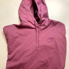 -Pink -Never Worn (Nwt) -Loose Fit -Adjustable Hood -Cotton Fabric Nike Pink Sweatshirt For Streetwear, Pink Fleece Hoodie For Sportswear, Pink Fleece Sportswear Sweatshirt, Pink Fleece Sportswear Hoodie, Pink Fleece Hoodie Sportswear, Pink Fleece Sweatshirt Sportswear, Casual Nike Hoodie For Workout, Sporty Purple Hoodie For Sports, Pink Sweatshirt For Workout In Spring