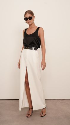 The luxury silk Isola Cami is a wardrobe staple. Constructed from high-quality silk for a relaxed fit, it adds a touch of elegance to any outfit. Perfect for day-to-night dressing, it will become a go-to piece. Styled with our Gretta pants. 100% Silk Dry Clean only White Silk Top Outfit, White Silk Maxi Skirt, White Silk Skirt Outfit, Silk Cami Outfit, Silk Pants Outfit, Linen Skirt Outfit, Silk Top Outfit, Silk Shirt Outfit, Silk Skirt Outfit