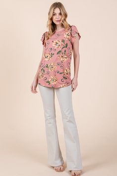 Floral Elegance Meets Effortless Comfort: Soft Knit Jersey Top with Flutter Sleeves Embrace Casual Chic with Floral Flourish Elevate your casual wardrobe with our Floral Print Top, crafted in soft knit jersey with charming flutter sleeves. This versatile piece effortlessly combines floral elegance with the comfort of a loose fit. Stylish and Relaxed Style: CasualPerfect for a laid-back yet stylish look, this Floral Print Top is an essential addition to your casual wardrobe. Embrace a relaxed vib Stretch Rayon V-neck Blouse, Spring Floral Print Tops With Flutter Sleeve, Chic Flowy Flutter Sleeve Tops, Chic Flowy Top With Flutter Sleeves, Spring Short Sleeve Elastane Blouse, Summer Viscose Top With Flutter Sleeves, Feminine Floral Print Stretch Tops, Casual Flutter Sleeve Rayon Tops, Viscose Flutter Sleeve Tops For Summer