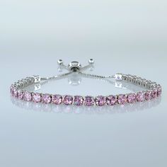 Brand New Women's White Gold & Pink Sapphire Tennis Bracelet 18k White Gold Plated Sterling Silver Genuine 2ct Natural Pink Sapphire Gemstones Adjustable Band To Fit Any Size Women's Wrist Retail Price $300 Buy With Confidence From A Trusted Seller With A 99%+ Feedback Rating! A0225 (Id-9) Elegant Silver Tennis Bracelet With Channel Set, Elegant Silver Channel Set Tennis Bracelet, Elegant Silver Tennis Bracelet Channel Set, Elegant Pink Jewelry With Channel Set, Elegant Adjustable Pink Sterling Silver Bracelet, Elegant Pink Channel Set Jewelry, Luxury Silver Gemstone Tennis Bracelet, Luxury Silver Tennis Bracelet With Gemstones, White Gold Tennis Bracelet With Gemstones