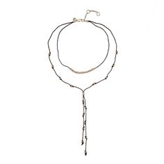 "This gorgeous Bella Uno metal beaded cord Y-necklace features two layers for a unique and stylish look that you're sure to love! This gorgeous Bella Uno metal beaded cord Y-necklace features two layers for a unique and stylish look that you're sure to love! Pendant length: 6 in. Chain length: 18 in. with 3-in. extender Chain type: cord Metal: zinc Plating: gold tone, silver tone Finish: worn Packaging: decorative card Please note, due to the high value of this item, a signature may be required Metal Lariat Layered Necklace With Adjustable Chain, Adjustable Metal Lariat Drop Necklace, Adjustable Lariat Layered Necklace, Adjustable Metal Lariat Necklace Choker, Metal Lariat Choker Necklace With Adjustable Length, Lariat Choker With Clavicle Chain, Beaded Metal Layered Necklace As Gift, Metal Beaded Chain Necklaces For Layering, Adjustable Metal Lariat Necklace