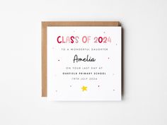 a graduation card with the words class of 2021 printed on it and a gold star