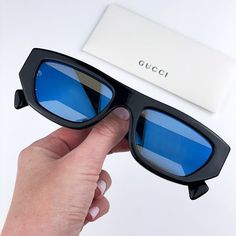 Gucci Gg1134s 001 Sunglasses Black Blue Mirrored Rectangle Unisex Brand: Gucci Model: Gg1134s Color Code: 001 Gender: Men/Unisex Year: 2022 Frame Colour: Black Frame Shape: Rectangle Frame Style: Full Rim Frame Material: Acetate Lens Color: Blue Mirrored Lens Material: Nylon Uv Protection: Category 3 Size: 53x19x145 100% Uv Protection Made In Italy. Full Retail Package With All Accessories: Case, Cloth And All Paperwork. 100% Authentic! Trendy Blue Gucci Sunglasses, Gucci Blue Sunglasses With Gradient Lenses, Blue Gucci Sunglasses With Gradient Lenses, Aviator Sunglasses Mens, Rectangle Frame, Pilot Sunglasses, Gucci Models, Blue Mirrors, Rectangular Sunglasses