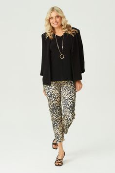 Step out in style with the In the Wild 7/8 Stretch Pant in Black Mix. Featuring a bold animal print, these pants offer a chic and modern look. The 7/8 length and pull-on design with a drawstring waist tie provide comfort and ease. Front stitch rounded jean pockets add a touch of practicality to this fashionable piece. Printed animal design 7/8 length Pull-on style Drawstring waist tie Front stitch rounded jean pockets Our Model Chella is wearing a size XS. She is 175cm tall with an 89cm bust, 74cm waist and 96cm hips. Jean Pockets, Cardigan Vest, Pant Shirt, In The Wild, Stretch Pants, Animal Design, Leisure Wear, Waist Tie, The Wild