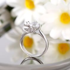 Chic and exquisite that you can't refuse to take, this lovely ring in Hug Me® collection is a must-have addition to your jewelry collection! Crafted in sterling silver, it features a shimmering round cut stone hugged by a cute polar bear figure. Polished to a brilliant shine, this ring honors your loving commitment to each other. You will find more adorable and creative designs in our Hug Me® collection.Carat Weight: 2.5 ctStone Size: 7 mmStone Type: Jeulia® StoneNumber of Stones: 1 Stone Color: Diamond WhiteStone Shape: RoundWeight: 4.12 gWidth: 8.7 mmHeight: 2.1 mmThickness: 2.9 mmMaterial: 925 SilverPlating Color: Silver 14k White Gold Jewelry For Proposal, Fine Jewelry Sterling Silver For Wedding Proposal, White Diamond Sterling Silver Ring For Proposal, White Sterling Silver Rings For Proposal, Sterling Silver Solitaire Jewelry For Proposal, Sterling Silver Open Ring For Proposal, Sterling Silver White Gold Diamond Ring For Proposal, Fine Jewelry Silver Diamond Proposal Ring, Silver 14k White Gold Jewelry For Proposal