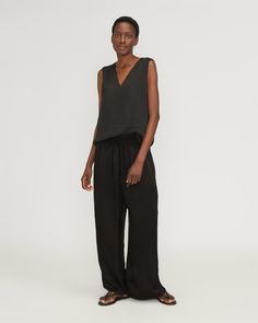 The Satin Pull-On Pant Black – Everlane Versatile Wide Leg Pull-on Pants For Loungewear, Chic Pull-on Style Wide Leg Pants For Loungewear, Chic Wide Leg Loungewear Pants With Pull-on Style, Versatile Pull-on Wide Leg Pants For Loungewear, Versatile Wide Leg Pull-on Lounge Pants, Relaxed Wide Leg Pants With Elastic Waistband For Work, Versatile Ankle-length Viscose Wide Leg Pants, Versatile Relaxed Fit Viscose Bottoms, Relaxed Fit Viscose Bottoms