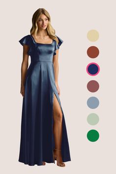 a woman in a long blue dress standing next to color swatches and the colors