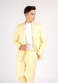 Experience true elegance in this Liberty Light Yellow Linen Suit. Handcrafted from 100% linen, this eye-catching custom made suit will make you look and feel like a million bucks with its bright and stylish summer vibes. Perfect for stand out occasions, your exquisite outfit will turn heads. Luxury Fitted Summer Sets, Luxury Fitted Sets For Summer, Luxury Fitted Suits For Spring, Elegant Slim Fit Spring Sets, Summer Wedding Suits Single Breasted, Classic Yellow Notch Lapel Suits, Luxury Cotton Suits With Notch Lapel, Luxury Spring Wedding Suits, Elegant Yellow Summer Sets