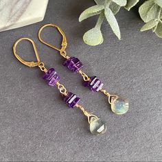 Handmade Gemstone Earrings Made With Genuine Natural Purple Amethyst Flat Square Beads And Wire Wrapped With Labradorite Teardrop Details: * Gemstone: Amethyst & Labradorite. * Metal: 14k Gold Filled (Not Plated) Made To Order In Sterling Silver. * This Style Is Leverback As In Pictures, But It’s Available In Ear Hooks Too. Purple Handmade Jewelry, Purple Long Drop Jewelry With Ear Wire, Purple 14k Gold Filled Jewelry As A Gift, Purple 14k Gold Filled Jewelry Gift, Purple Long Drop Earrings For Gift, Purple Long Drop Jewelry For Gift, Purple Amethyst Jewelry With Ear Wire, Purple Drop Earrings With Natural Stones, Purple Natural Stones Drop Earrings