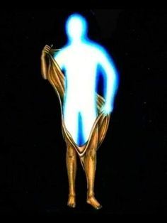 an image of a man standing with his hands on his hips and glowing in the dark