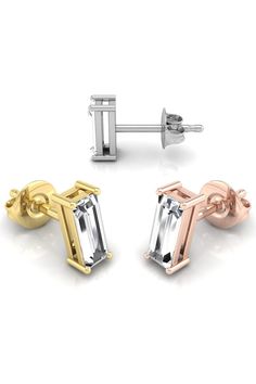 ✥ Introducing our Baguette Cut Moissanite Diamond Stud Earrings for Her, a timeless symbol of sophistication and grace. Each earring showcases a stunning baguette-cut moissanite diamond, meticulously set in a classic stud design, exuding understated elegance and refinement. The sleek lines and geometric shape of the baguette cut add a modern touch to these earrings, while the brilliance of the moissanite diamonds ensures a captivating sparkle that catches the light with every movement. Perfect f Charles And Colvard Moissanite, Stud Design, Timeless Symbol, Bridal Bands, Diamond Stud Earrings, Bridal Ring Set, Diamond Stud, Baguette Cut, Understated Elegance