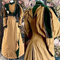 "Offered here is a truly museum-worthy winter gown from right around 1905. It is made of an unusual-textured, deep tan [with just a hint of olive] fine wool in a pattern of diagonal 'stripes' of shaped wavy lines reminiscent of leaves - looks almost like a mismatched chevron. The gown is trimmed with a rich, dark green velvet in exceptional condition - just a few light spots. It has some very unique elements with dressmaker detailing for those studying this era of dress construction. Inside the Glided Age, 1890 Dress, Victorian Wardrobe, Winter Gown, Dress Construction, Winter Gowns, 1890s Fashion, Dark Green Velvet, Historical Dress