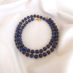 Necklace With 8mm Round Lapis Lazuli Beads, Lapis Lazuli Round Beaded Necklaces, Lapis Lazuli Necklaces With 8mm Beads, Lapis Lazuli Necklace With 8mm Beads, Everyday Blue Jewelry With 8mm Beads, Lapis Lazuli Round Beads Necklace For Gift, Sapphire Jewelry With 8mm Beads As Gift, Blue Necklaces With 8mm Beads As A Gift, Sapphire Round Bead Necklaces For Gifts