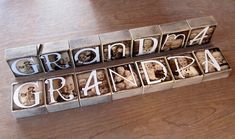 a wooden table topped with lots of metal type blocks filled with photos and words that spell grandma