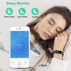 a woman sleeping in bed with her head on the pillow and an alarm clock next to her