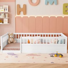 a child's room with pink walls and white crib, teddy bear on the floor