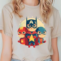 Title: Super Hero T-shirt, Kids Super Hero T-shirt, Superhero T-shirt, Cartoon Hero Shirt, Super Power T-shirt, Superhero Birthday T-shirt  Brand Detail: Introducing the soft and stylish Gildan 64000 Fitted T-Shirt, made with 7.5 oz. of 100% cotton. It's got a specific Euro Pattern with a fashion fit in the neck, shoulders and sleeves. The 64000 Fitted T-shirt is one of Gildan's most popular additions to their incredible line up of inexpensive and high-quality garments. With new slim fitting fea Cheap Multicolor Character Print T-shirt, Kids Super Hero, Superhero Kids, Hero Costumes, Superhero Birthday, Super Hero Costumes, Indian Fashion Dresses, Fashion Fits, Super Heroes