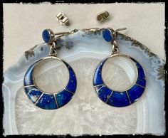 Vintage Native American inlay lapis earrings Beautiful lapis earrings with nice inlay work and lovely design. Good vintage condition, nice patina, ready to rock! Measurements : top : 6mm diameter dangle : 7/8" diameter sterling silver lapis Blue Inlay Earrings For Gifts, Blue Inlay Earrings For Gift, Blue Sterling Silver Earrings With Inlay, Lapis Earrings, Nov 6, Creative Jewelry, Favorite Jewelry, Native American, Jewelry Earrings Dangle