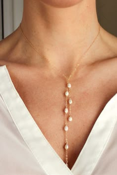 Pearl Tendril Lariat Tie Necklace - Christine Elizabeth Jewelry #14K-Gold-Filled #affordable-bridal-jewelry #beach-wedding-jewelry Pearl Dangle Lariat Necklace, Pearl Pendant Lariat Necklace, Elegant Dangle Lariat Necklace With Pearl Pendant, Formal Dangle Lariat Necklace With Pearl Drop, Elegant Pearl Drop Dangle Necklace, Elegant Long Drop Single Strand Lariat Necklace, Formal Dangle Pearl Drop Lariat Necklace, Elegant Long Drop Pearl Necklace, Pearl Chain Lariat Necklace