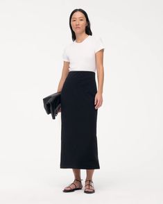 Classic, understated, and versatile - the Tube Skirt has a slim, body-gracing fit whose length can be adjusted by lifting, lowering, or folding the elasticated waist. For elevated casual, pair with the T-Shirt. This custom fabric features a premium organic cotton expertly knit together with lyocell. The lyocell in this Modern Fitted Maxi Skirt For Spring, Classic Fitted Cotton Skirt, Classic Fitted Cotton Pencil Skirt, Classic Cotton Fitted Pencil Skirt, Modern Fitted Maxi Skirt, Versatile Fitted Maxi Skirt For Work, Fitted Versatile Maxi Skirt For Work, Fitted Modern Lined Maxi Skirt, Modern Fitted Lined Maxi Skirt