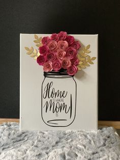 a card with flowers in a mason jar