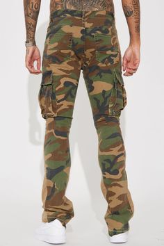 Model Height: 6'4 - Waist Size: 34 - Wearing Large Big & Tall: Height 6'5 - Waist Size: 42 - Wearing XXXL Available In Camouflage. Cargo Pockets Zip Fly Button Closure 5 Pocket Body Contrast Panel Flared Fit 98% Cotton, 2% Spandex Disclaimer: To Keep the Aesthetic of This Garment, Please Follow the Care InstructionsCarefully Imported | Mens Commando Cargo Twill Flared Pants in Camouflage size 42 by Fashion Nova Camouflage Fashion, Tall Height, Men Jeans Pants, Jumpsuit Men, Mens Pants Fashion, Twill Pants, Flared Pants, Big & Tall, Flare Pants