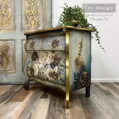 a planter sitting on top of an old dresser