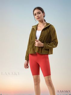 Lasaky - Premium Womens Lightweight Windbreaker Jacket - Enhanced Breathability and Waterproofing for Optimal Comfort! Lightweight Hooded Sporty Outerwear, Lightweight Long Sleeve Windbreaker For Outdoor, Stretch Windproof Outerwear For Outdoor Activities, Stretch Windproof Outerwear For Outdoor, Casual Lightweight Outerwear For Sports, Stretch Outerwear With Pockets For Outdoor, Solid Windbreaker For Outdoor Activities Sportswear, Lightweight Nylon Sports Outerwear, Sports Long Sleeve Nylon Raincoat