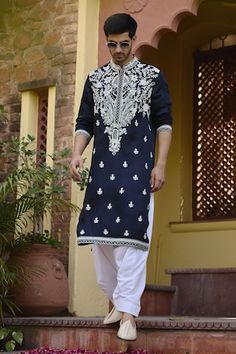 Navy blue kurta with kiran dori work in floral pattern. Paired with an ivory salwar. - Aza Fashions Dola Silk Kurta With Chikankari Embroidery And Traditional Drape, Chikankari Embroidered Kurta In Dola Silk With Traditional Drape, Chanderi Sherwani With Chikankari Embroidery For Navratri, Chikankari Embroidery Dola Silk Kurta With Traditional Drape, Blue Chanderi Sherwani For Diwali, Chikankari Embroidery Dola Silk Kurta, Blue Chanderi Sherwani With Zari Work, Blue Bollywood Style Sherwani In Chanderi, Blue Bollywood Style Chanderi Sherwani