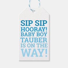 a tag that says sip sip hooray baby boy tauber is on the way