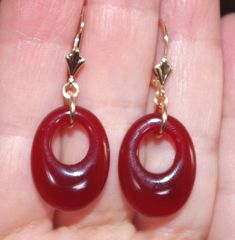 Quality 14K Genuine Red Jade Semi Roud Oval  Hoop Leverback Earrings You are buying a pair r of Vintage Old Stock High Polish Red Jade  hoops stones. These Red Jade  stones measure 20 mm x 15 mm. The whole earrings with leverbacks measures 35 mm. These are gorgeous. 5.6  Grams /  27.5  Carats Comfortable to Wear / Medium Size You will love wearing them. Red Hoop Pierced Jewelry, Red Pierced Hoop Jewelry, Red Hoop Jewelry For Formal Occasions, Red Hoop Pierced Earrings, Red Small Hoop Jewelry For Anniversary, Elegant Small Hoop Red Earrings, Red Oval Classic Earrings, Classic Oval Red Earrings, Red Oval Earrings For Anniversary