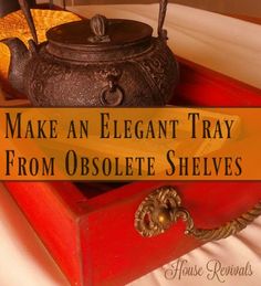 an old teapot sitting on top of a red box with the words make an elegant tray from obsolete shelvings