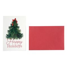 a card with a christmas tree on it next to a red envelope that says happy holidays