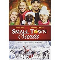 small town santa dvd cover with family and dog in snow scene on the back ground