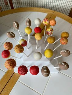 cake pops arranged in the shape of footballs