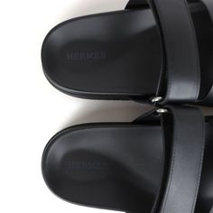 This pair of Chypre Techno sandals are in Black calfskin with black rubber soles and feature the iconic H and a velcro crossover strap.Origin: ItalyCondition: New and never wornAccompanied by: Hermes box, two shoe dustbags, ribbonSize: 38 EU Luxury Slides With Leather Sole And Single Toe Strap, Designer Leather Slides With Single Toe Strap, Luxury Leather Slides With Single Toe Strap, Black Calf Leather Sandals For Summer, Modern Calf Leather Sandals With Cushioned Footbed, Modern Slides With Double Strap And Removable Insole, Modern Slides With Removable Insole And Double Strap, Luxury Leather Sole Slides With Round Toe, Designer Calf Leather Sandals With Rubber Sole