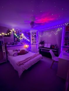 a bedroom with purple lights and a bed