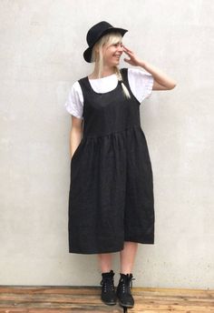 "Simple and comfortable linen pinafore sundress with handy pockets. Wear it alone or with a shirt underneath.  Easy to dress it up or down with a few accessories.  Great linen texture and drape.  Very comfortable and perfect for everyday wear as well as more special occasions. High quality linen with adorable texture.   Made from a 100% medium weight, natural European linen. The linen will become more distinctive the more you wear and wash it.  Each piece is individually cut, sawn and pre-washed Sleeveless Dress With Shirt Underneath, Dress With Shirt Underneath, Linen Pinafore Dress, Plus Size Sundress, Linen Pinafore, Black Sundress, Linen Sundress, Sukienki Plus Size, Linen Dress Women