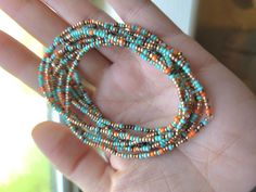 This listing is for a set of ten seed bead boho beaded bracelets. These southwestern style multi color confetti bracelets have dainty, tiny beads and are strung on strong elastic. They are double knotted and glued shut. These stretchy, stackable bracelets would be cute friendship bracelets or gifts for best friends, gifts for her. Southwestern Jewelry With Tiny Heishi Beads, Bohemian Stackable Stretch Bracelet For Festivals, Bohemian Heishi Beads Stretch Bracelet, Stackable Beaded Bracelets With Round Beads For Festivals, Bohemian Multi-strand Friendship Bracelets With Colorful Beads, Stackable Beaded Bracelets For Festivals, Bohemian Turquoise Friendship Bracelets With Spacer Beads, Bohemian Stretch Bracelet With Tiny Beads As Gift, Bohemian Stretch Bracelet With Round Beads For Summer