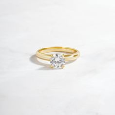 Engagement style ring featuring a round solitaire stone (1 ct size). It's a classic piece and great as a place holder for your engagement ring! • Made of 925 Sterling Silver• THICK plating of 14k Gold or Rhodium• Available in Sizes 4-12• Made of highest quality cubic zirconia• VERY HIGH QUALITY• Nickel-free & Hypoallergenic - will NOT turn fingers green!• 7mm Stone, 2.5mm Band Round Solitaire Ring, Round Solitaire Rings, Place Holder, Round Solitaire, Chunky Earrings, Engagement Style, Solitaire Studs, Chunky Rings, Stacked Jewelry