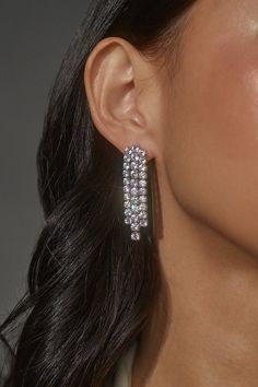 These classic and timeless earrings bring a touch of quiet luxury to any outfit. Featuring cascading cz stones, they provide the ultimate sparkle and lightweight fluid movement, making them an essential addition to your jewelry collection. Diamond Long Drop Chandelier Earrings, Long Drop Diamond Chandelier Earrings, Glamorous Drop Diamond Earrings, White Gold Rhinestone Crystal Earrings, White Gold Crystal Earrings With Rhinestones, Diamond Drop Earrings With Rhinestones, Glamorous Sparkling Dangle Diamond Earrings, Glamorous White Gold Crystal Earrings, Crystal Linear Earrings With Sparkling Stones