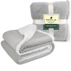 two blankets and one blanket folded up on top of each other with the label pavilla