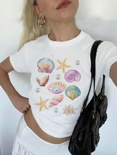 White Y2k Beach Top, Y2k Style Tops For Beach Vacation, Y2k Summer T-shirt For Beach, Y2k Short Sleeve Beach Tops, Y2k Style Short Sleeve Tops For Vacation, 90s Graphic Print Vacation Tops, 90s Graphic Print Tops For Vacation, T Shirt Ideas For Women, Printed Tees Women