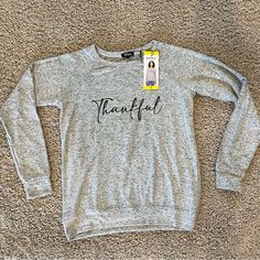 Buffalo David Bitton Thankful Cozy Crewneck Top Ultra Soft Gray Size Small Brand New Measurements In Photos Color: Heather Grey Thankful Super Soft Cozy Crewneck With Relaxed Fit & Banded Hem Ultrasoft Fabric Blend Crewneck Top Raglan Long Sleeves Banded Hem And Cuffs Relaxed Fit 76% Viscose 19% Polyester 5% Elastane Gift, Friends, Grateful From No Pet No Smoke House Trendy Heather Grey Sweatshirt For Fall, Trendy Heather Grey Fall Sweatshirt, Comfortable Gray Sweater For Fall, Gray Cozy Fit Top For Fall, Cozy Fit Gray Top For Fall, Cozy Gray Tops With Letter Print, Cozy Gray Top With Letter Print, Cozy Gray Letter Print Top, Gray Letter Print Sweatshirt For Fall